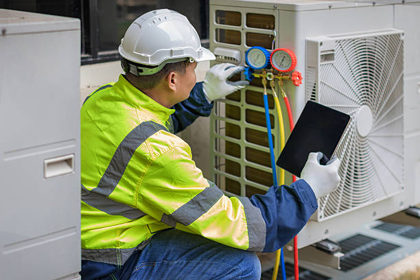 Professional Ac Installation technician working in Sandston, VA